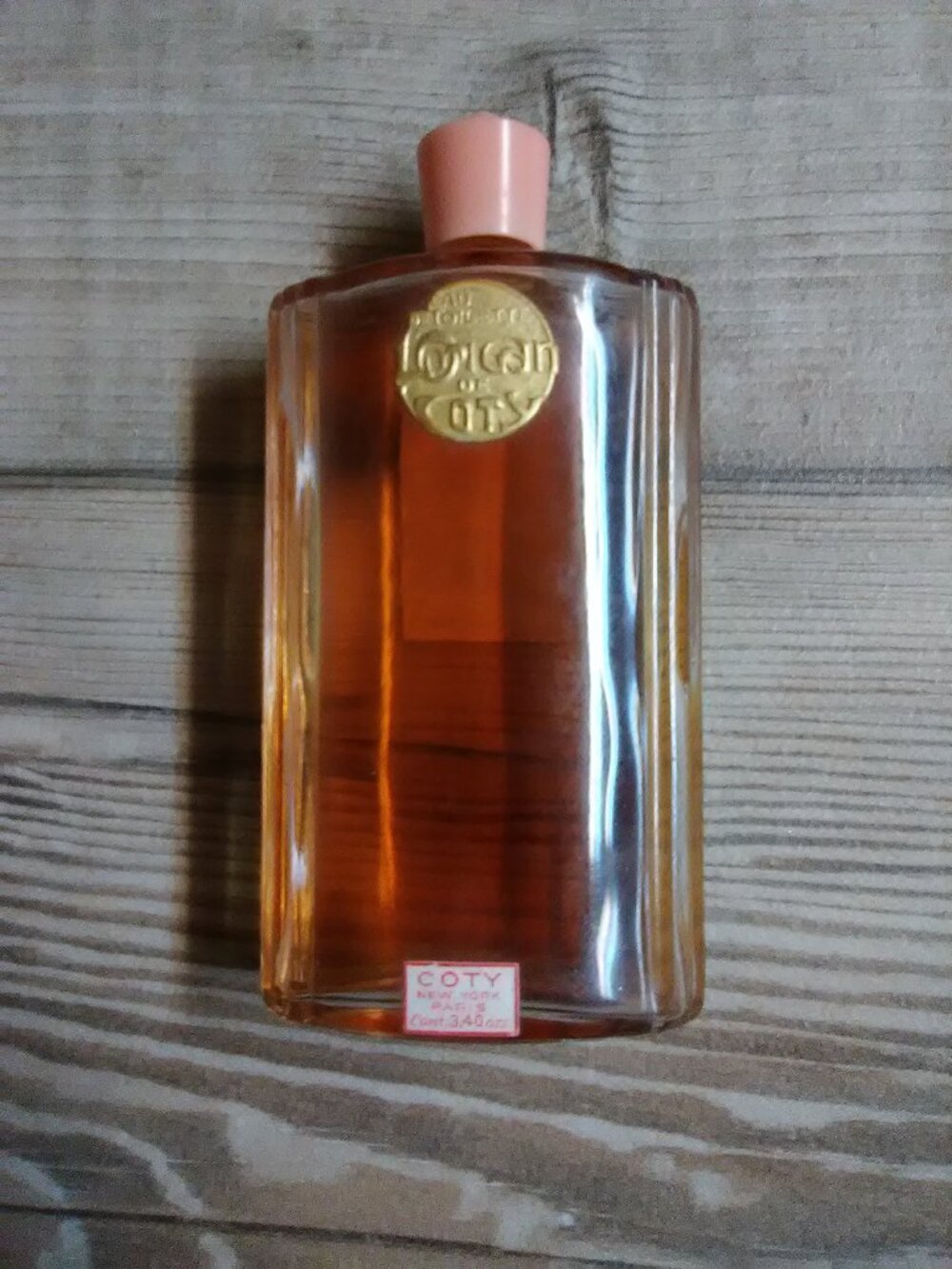 Vtg Coty L'origan toilette - some product still in glass bottle - pink cap ???